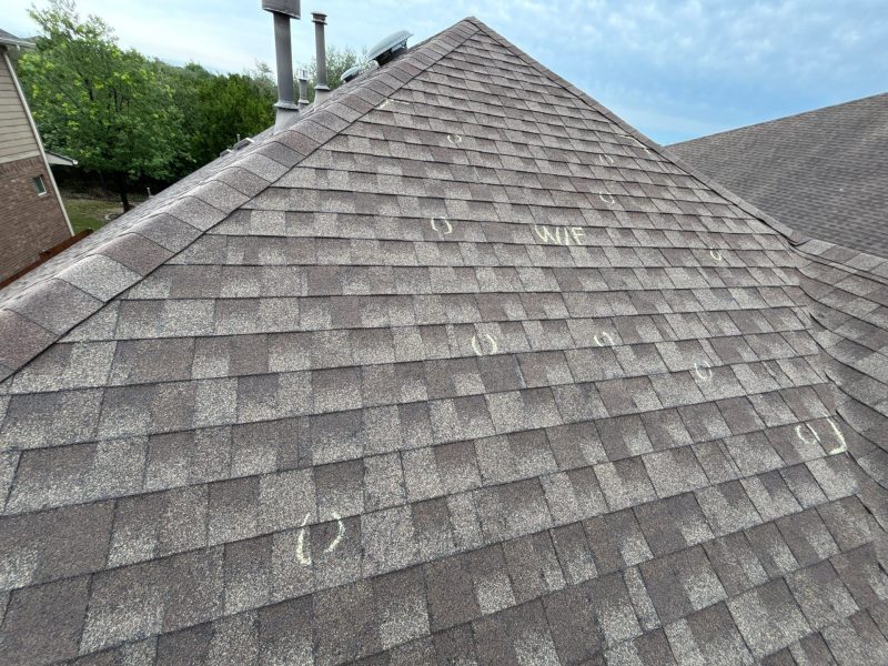 Storm Damage Markings for Wind and Hail, Cedar Park home with shingle roof.